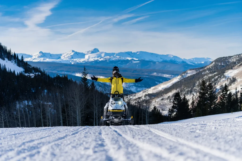 Single rider on a High Adventure guided snowmobile tour near Keystone, Colorado.
