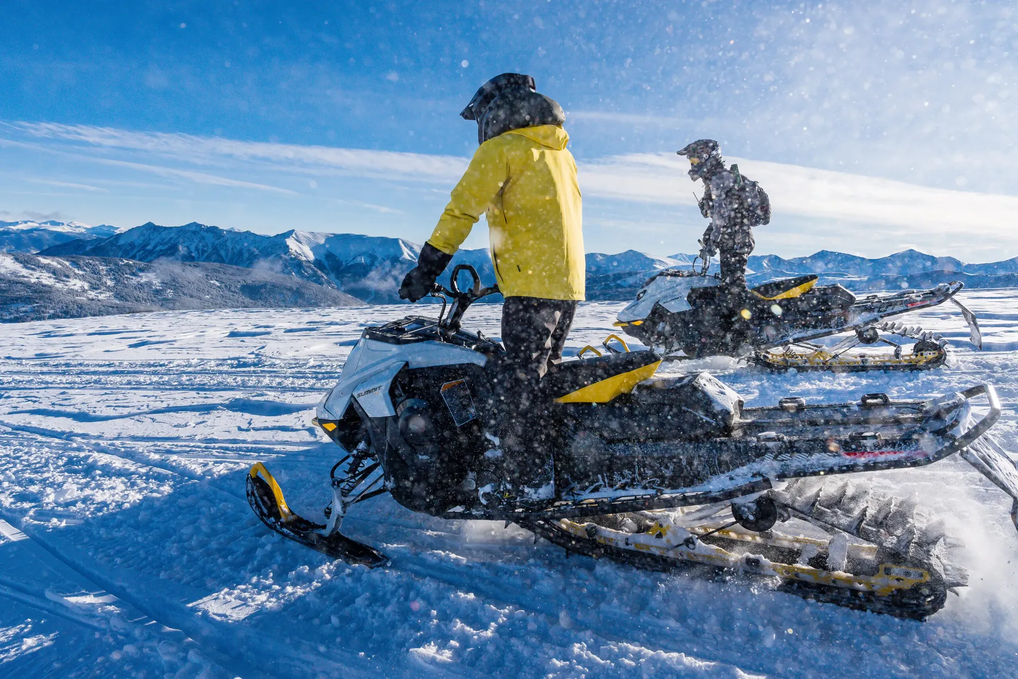 Riders on a guided Performance snowmobile tour at Fremont Pass near Keystone, Colorado